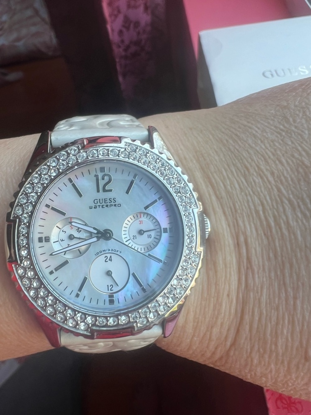Guess Silver Crystal-Bezel Watch with White Mother-of-Pearl Dial-need battery.